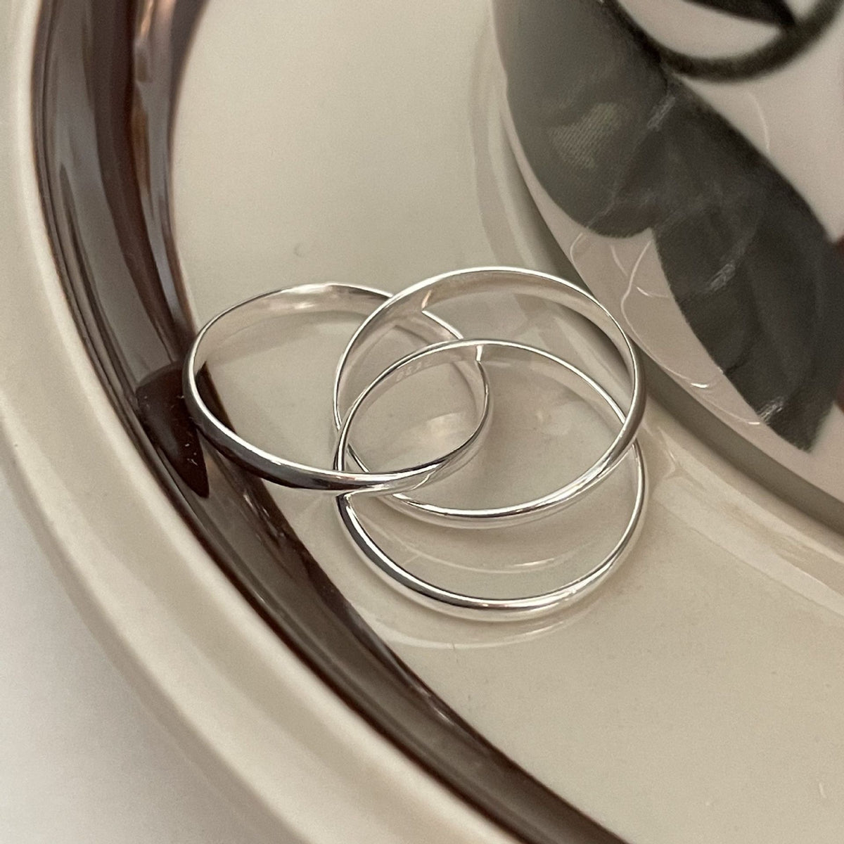 Trinity Rotation Ring
